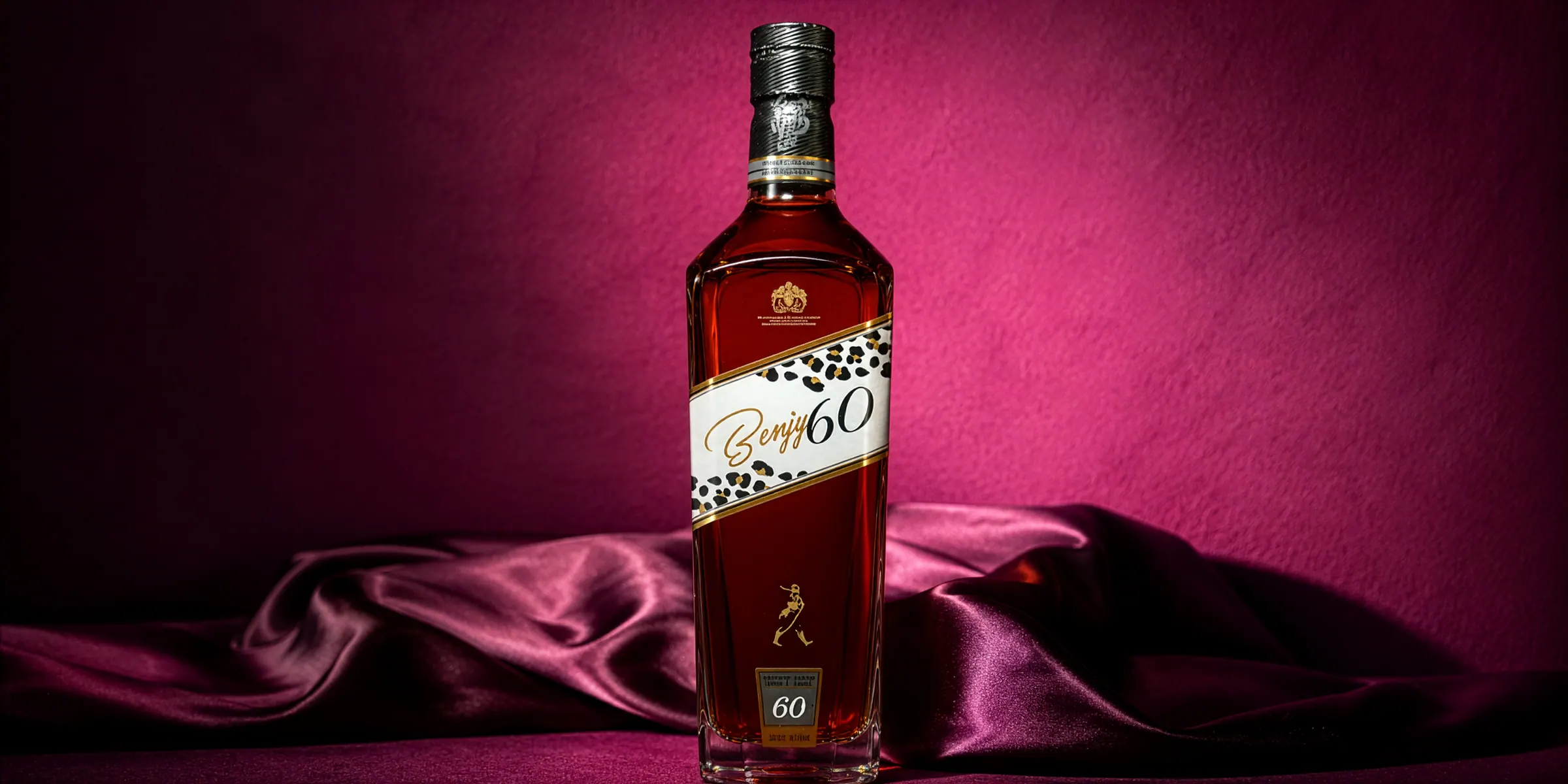 Benjy 60 whiskey bottle on magenta silk